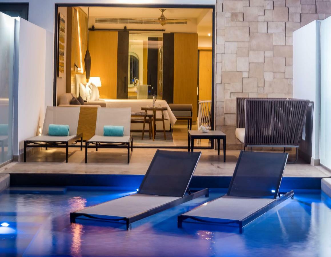 Haven Riviera Cancun (Adults Only) Alfredo V. Bonfil المظهر الخارجي الصورة A pool villa at the hotel